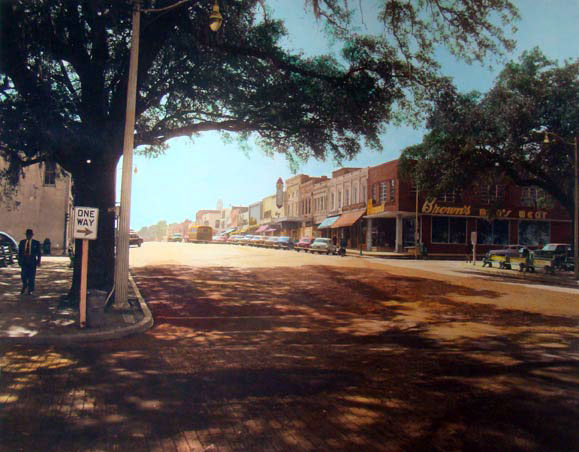 a long wide street with buildings down either side